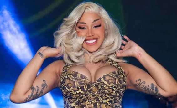 CARDI B’S PLUNGING MINI DRESS ALREADY MAKES HER LOOK ‘HOTTER & THICKER ’