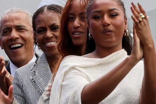 MALIA AND SASHA OBAMA MAKE RARE PUBLIC APPEARANCE AT OBAMA CENTER OPENING
